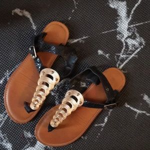 Black and gold sandals